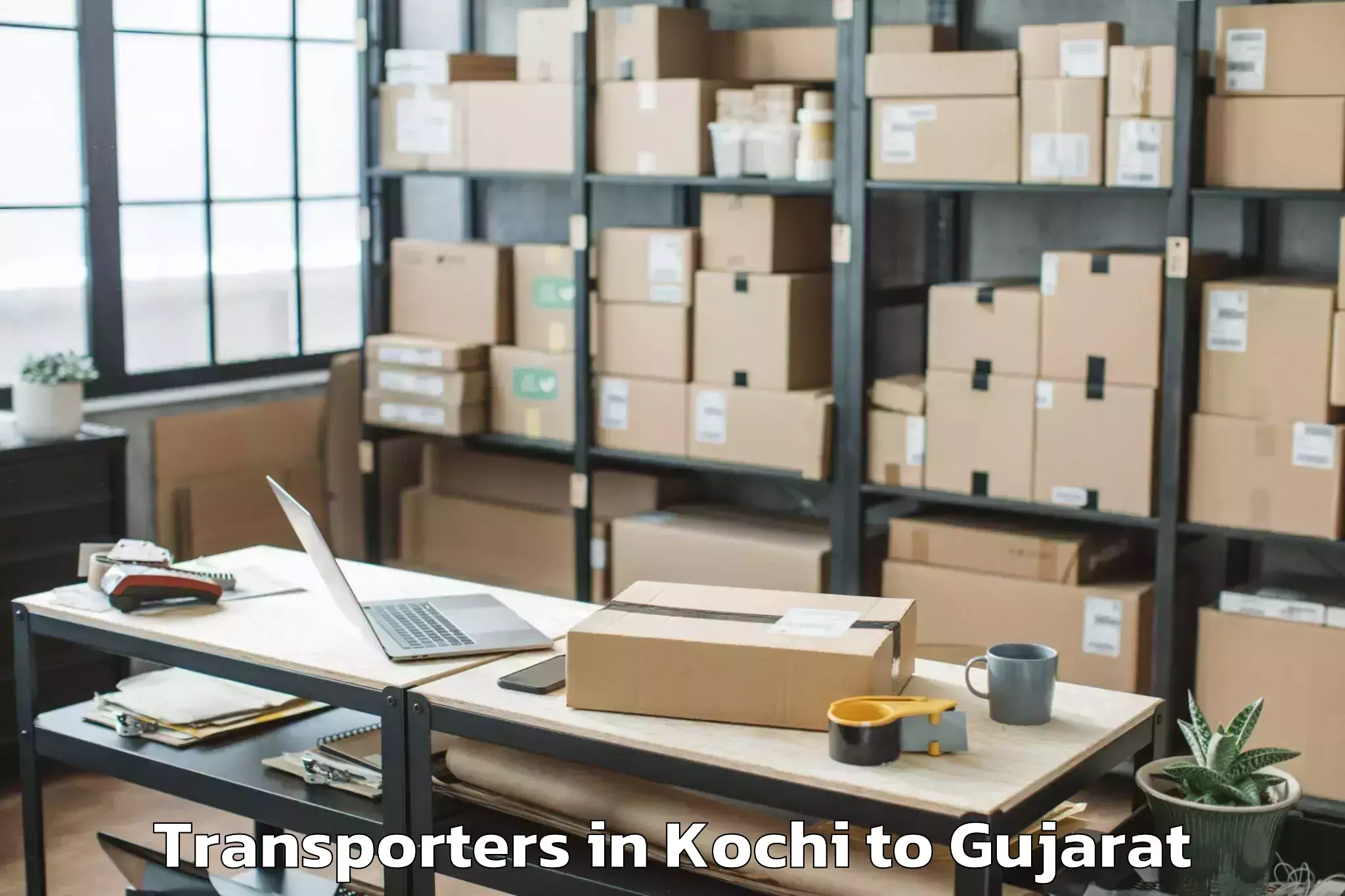 Top Kochi to Lunavada Transporters Available